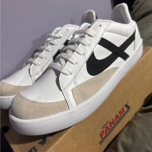 Trending now! Brand new in original box. Size 10. Panam brand sneakers.